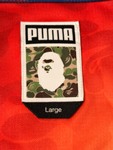 Load image into Gallery viewer, BAPE x PUMA BAPE FC Soccer Jersey – Red / Navy Camo – Large – PreOwned