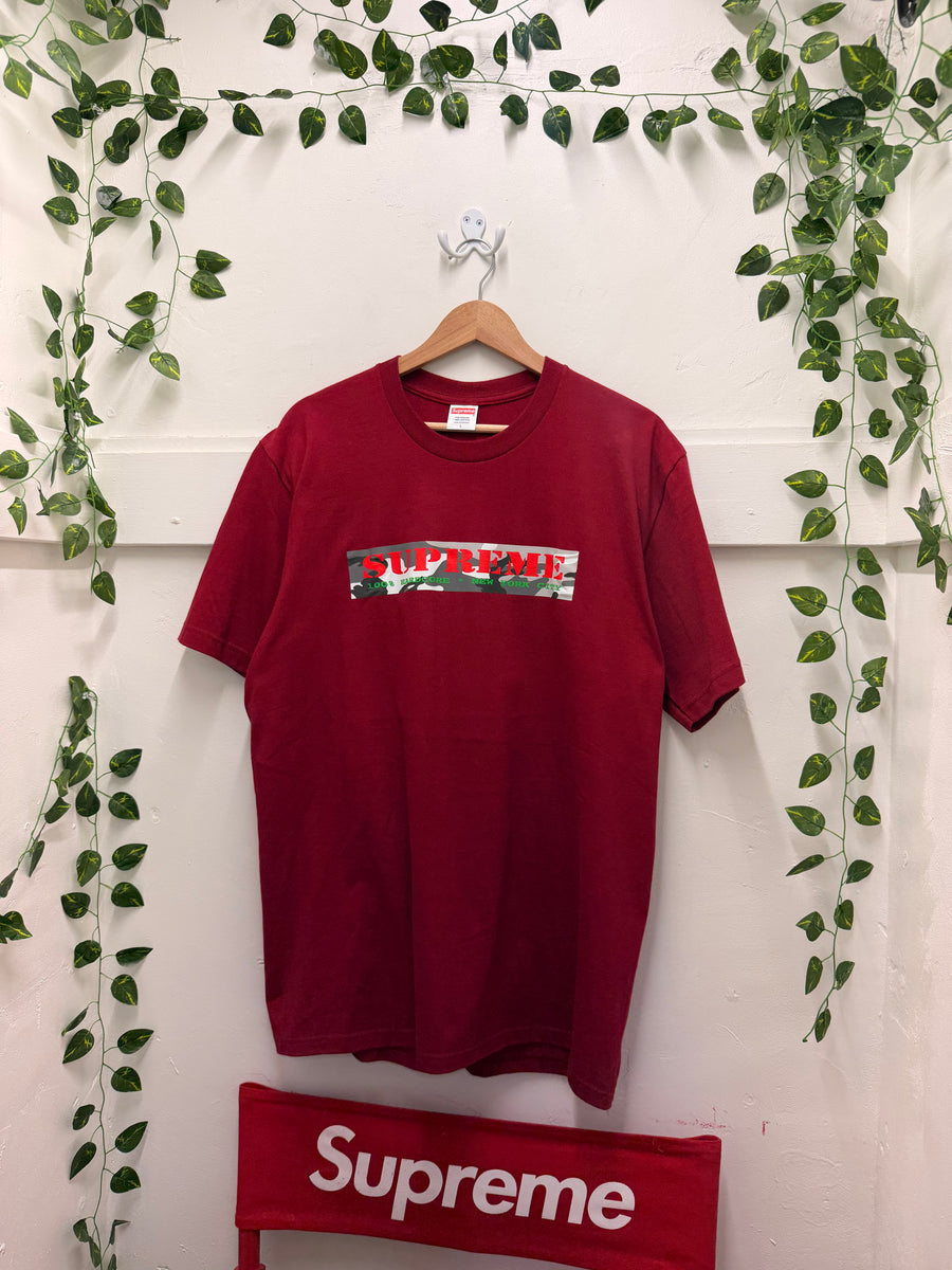 Supreme - 100% Hardcore NYC Camo Tee - Cardinal