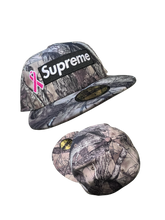 Load image into Gallery viewer, Supreme x New Era “Pink Ribbon Camo Box Logo” Fitted Hat 7 1/2
