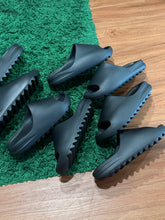 Load image into Gallery viewer, Yeezy Slide - Onyx - Brand New - Sizes 9,10,11,12 -
